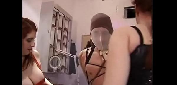  Whores with massive tits and cleavage wearing latex bind and gag a guy in hot fetish sex scene